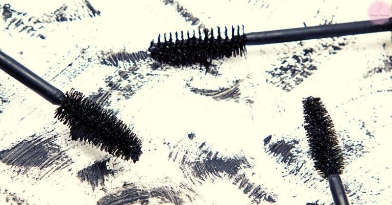 used mascara brushes with dried remnants on a light surface, illustrating mascara durability over time