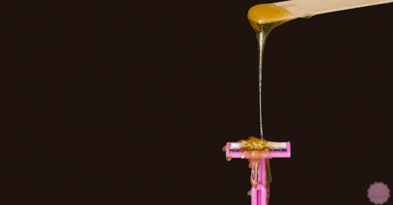 a close-up of honey dripping from a spoon onto a pink wax strip for hair removal comparison