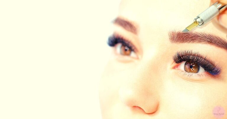 a close-up of a person’s eye with natural light eyebrows being subtly enhanced with a precision brow pencil, showcasing a makeup routine for defined brows.