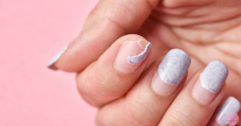a close-up of flexible, lightly chipped nail polish on soft, bendy nails with a focus on nail health and hydration.