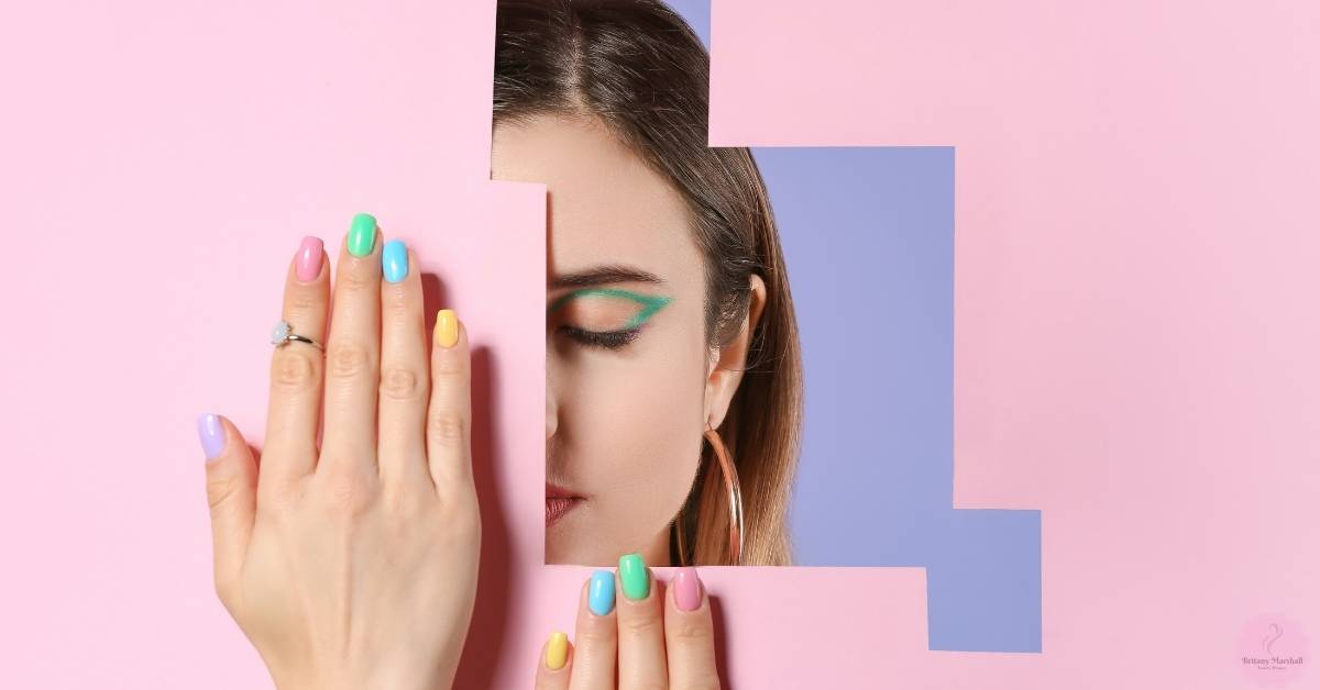 a person showcasing colorful press-on nails in vibrant shades, paired with a close-up of detailed eye makeup featuring green eyeliner.