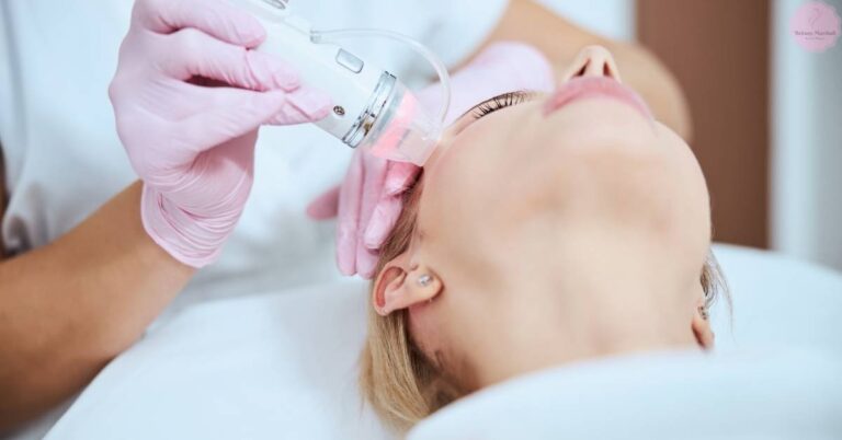 a person receiving a microneedling treatment for skin rejuvenation with a handheld device on their face.