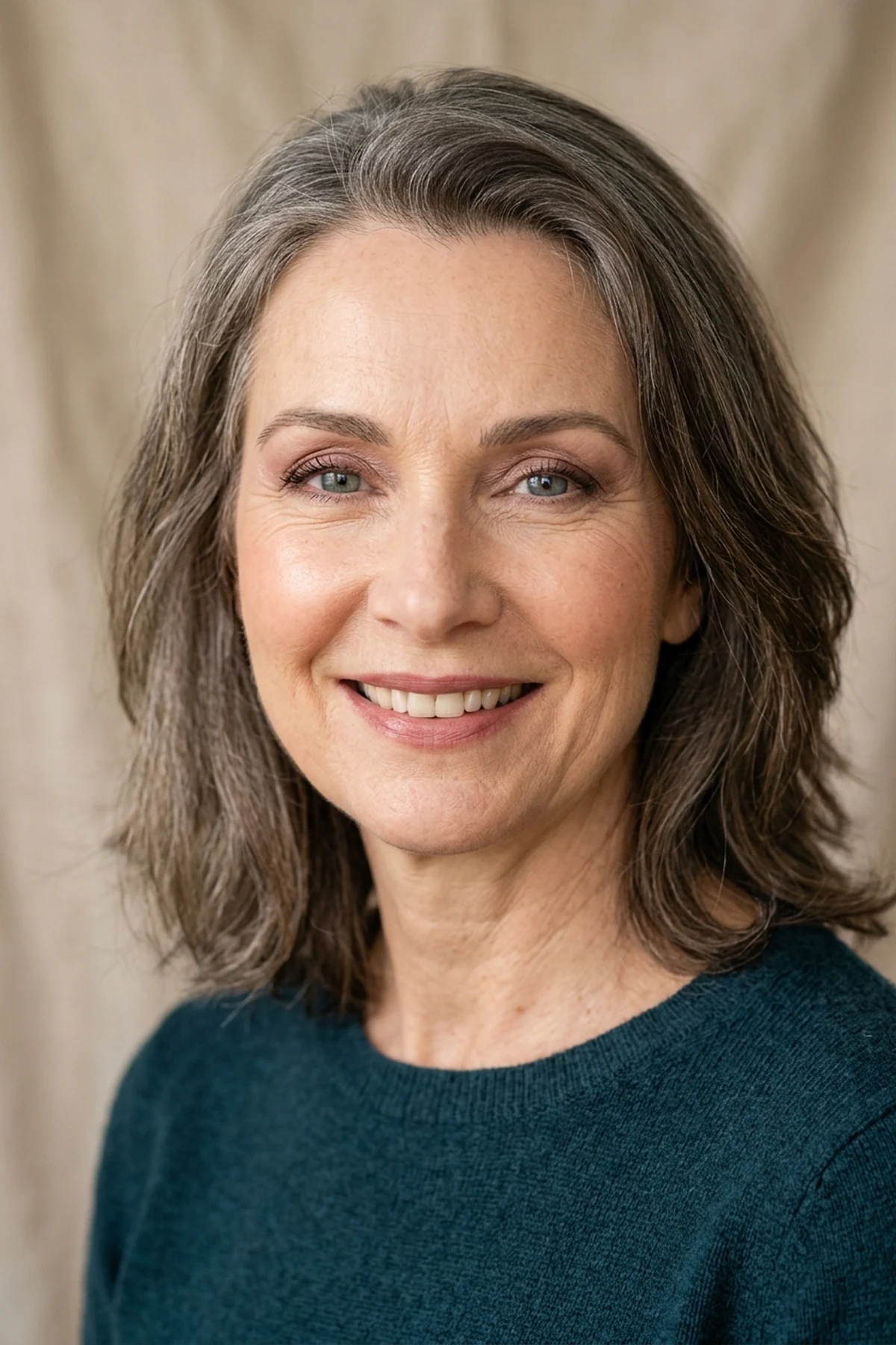 15 Step-by-Step Eye Makeup Tutorials: Flattering Eye Looks Mapped by Eye Shape (2026) 25 Natural studio beauty close-up of a mature woman over 50 wearing smooth rose-taupe cream eyeshadow with lifted outer corner definition (AI Generated Image)
